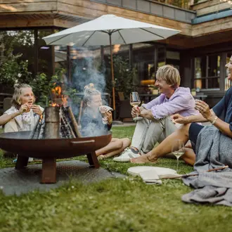 family in the hotel garden Theresia