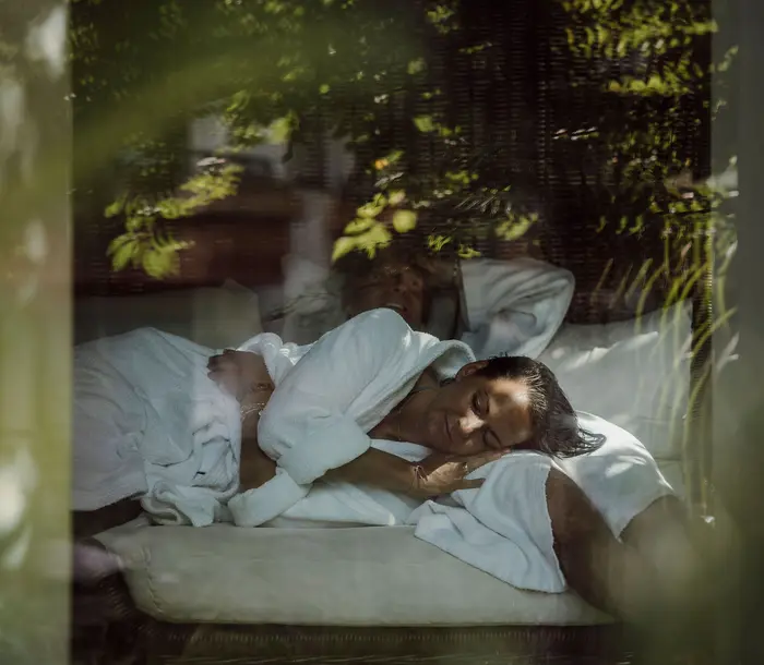 Couple in bathrobes in the wellness relaxation area