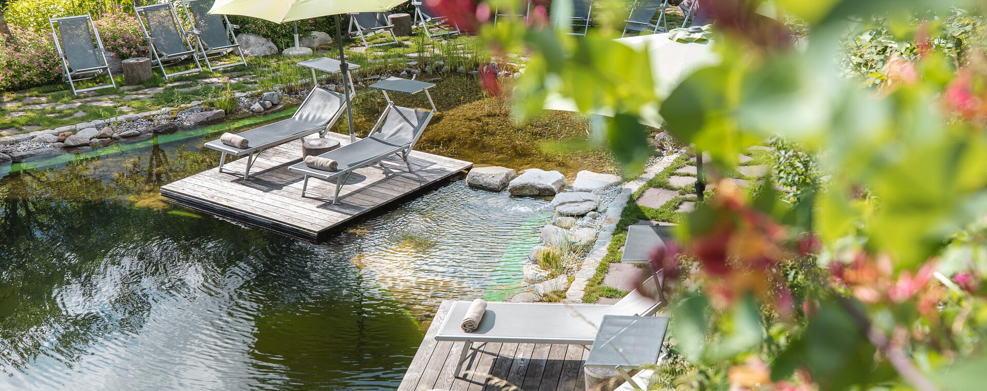 swimming pond garden hotel theresia in austria