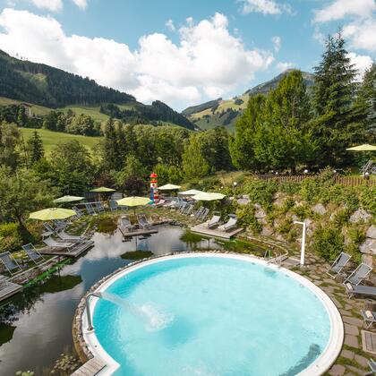 hotel with swimming pond and outdoor pool